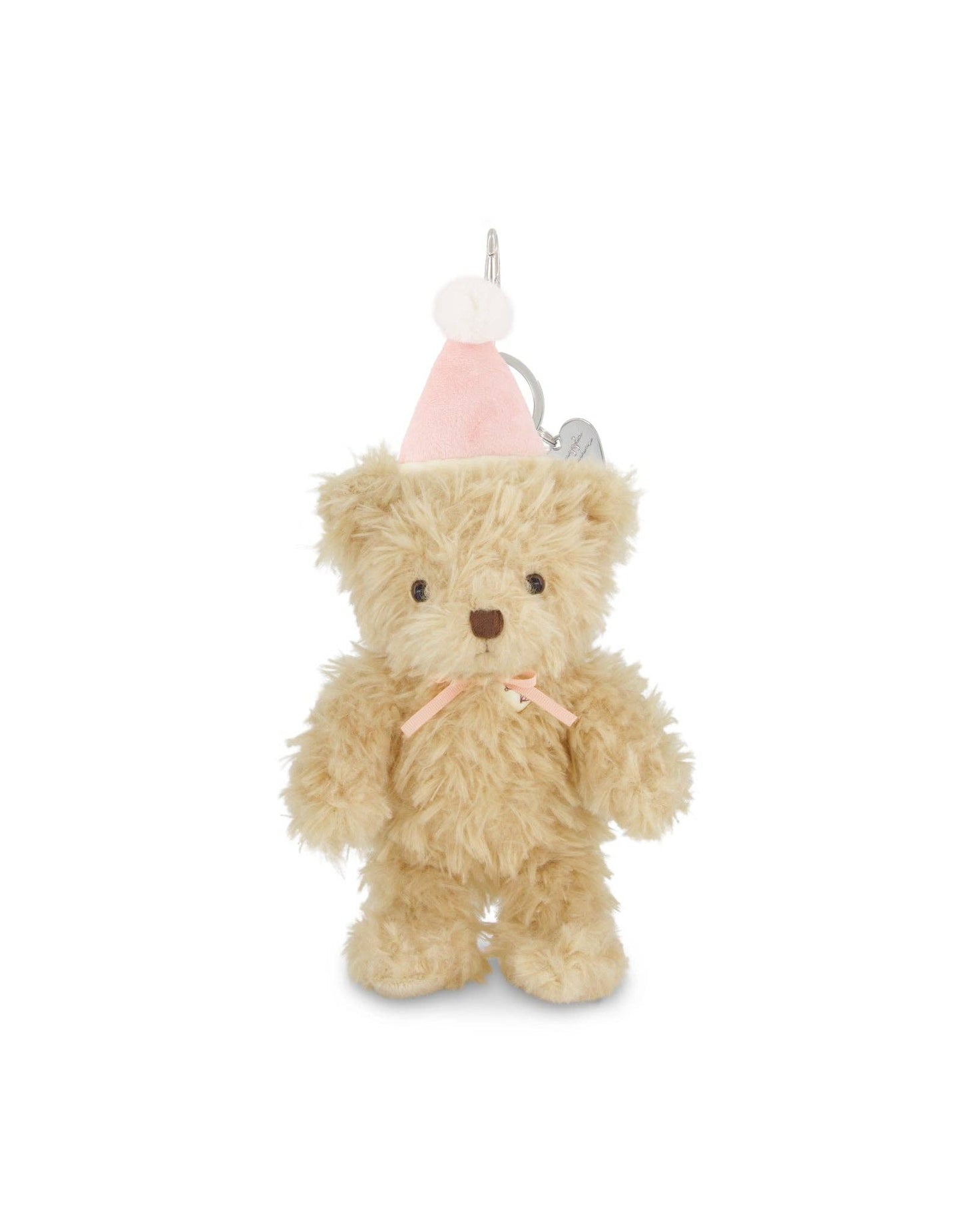 
                  
                    Small teddy bear wearing a pink party hat on a white background.
                  
                