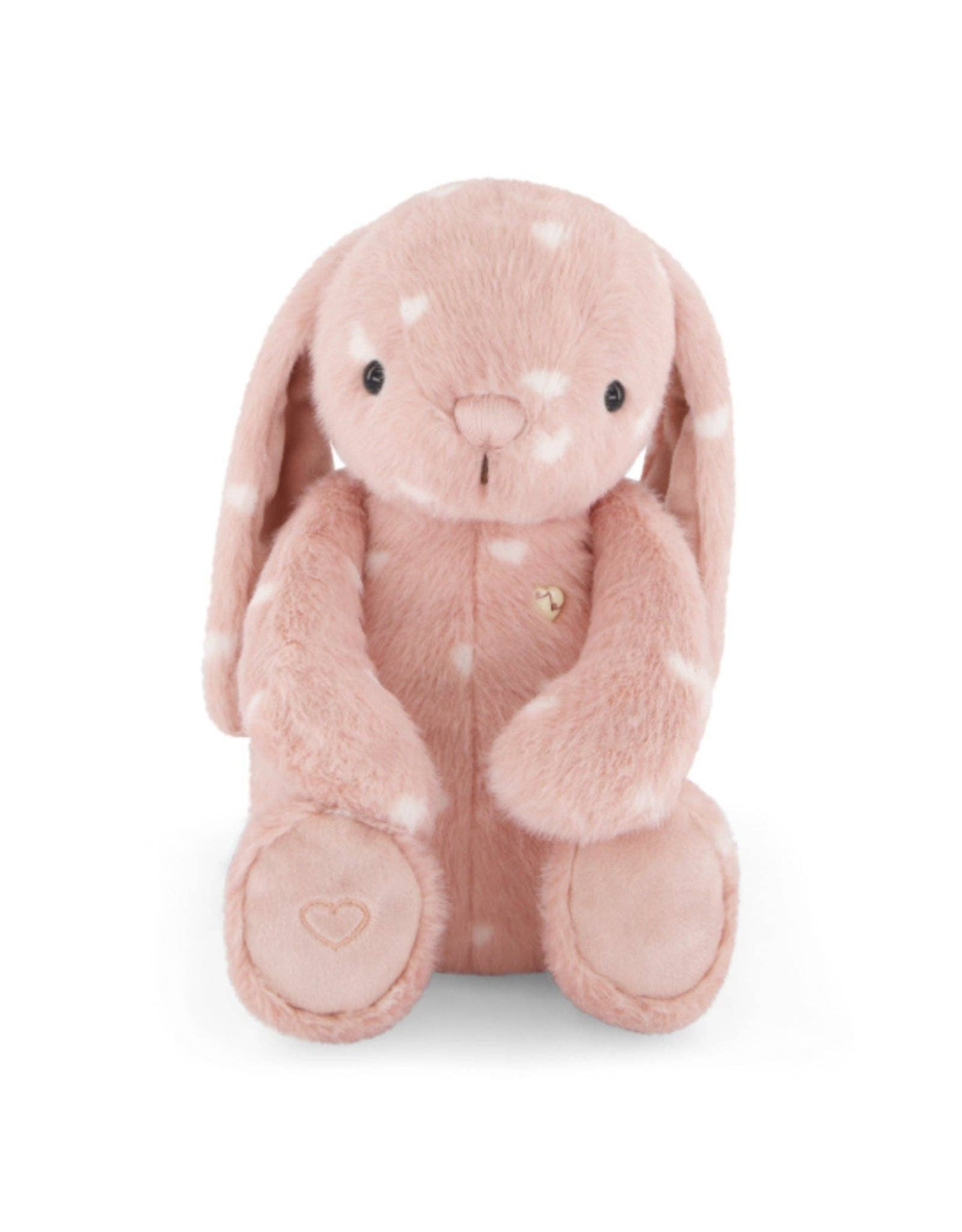Pink plush bunny toy with white spots on a white background.