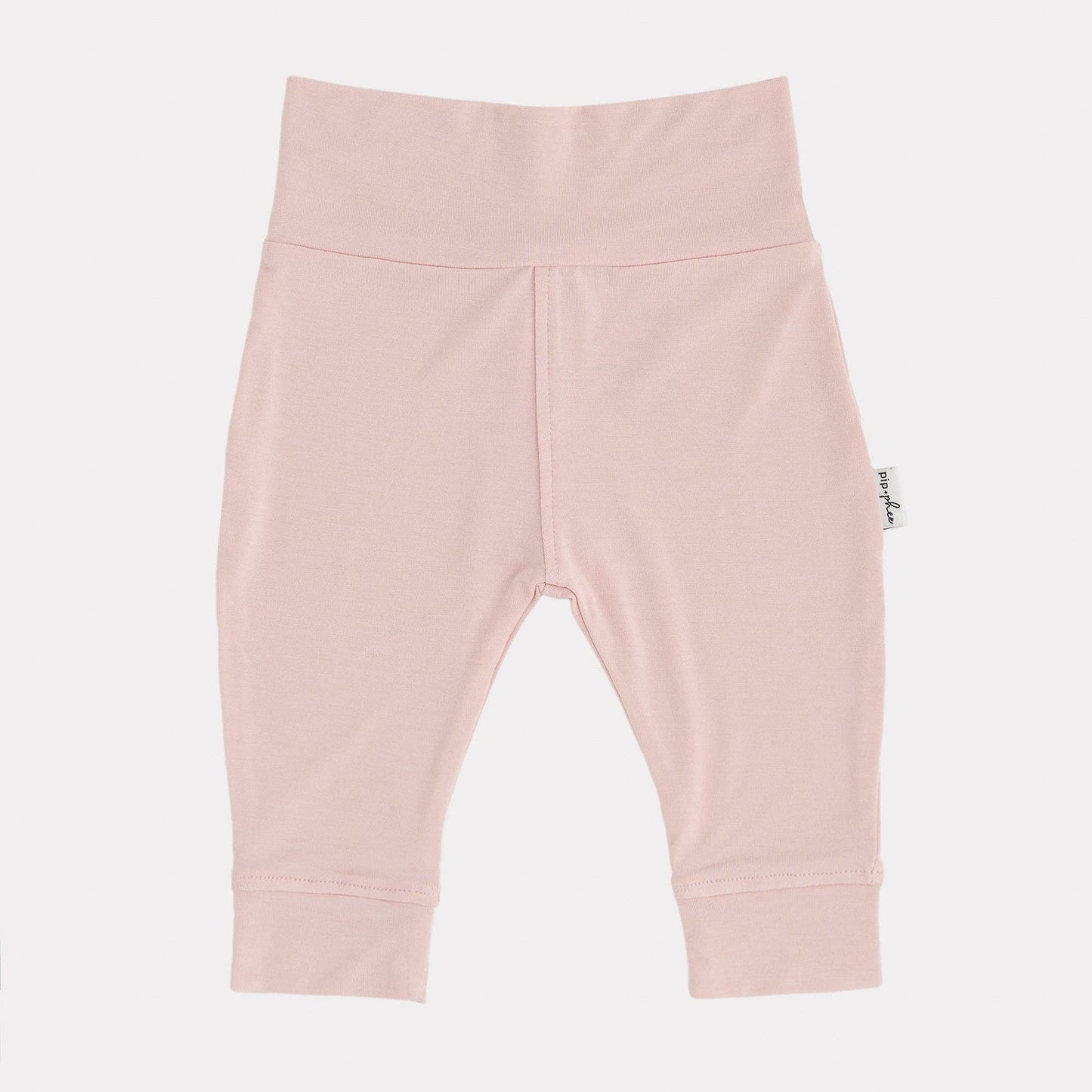 
                  
                    Pink baby leggings on a light gray background.
                  
                