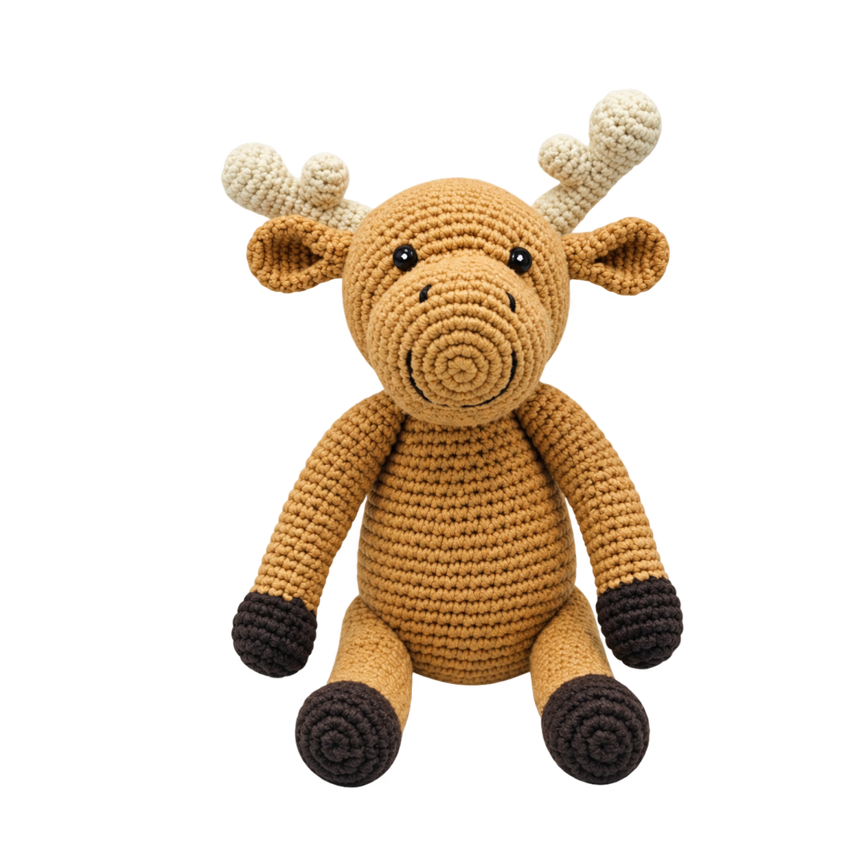 A crocheted moose plush toy with a warm tan body, cream-colored antlers, black eyes and nose, and dark brown hooves, centered on a plain white background.