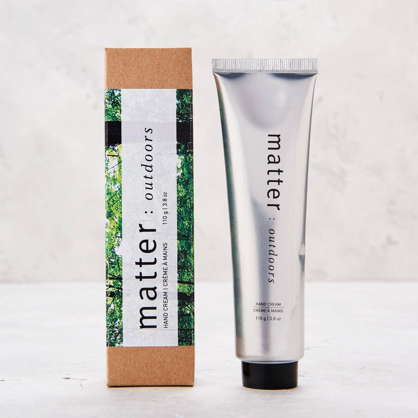 
                  
                    Hand cream tube and packaging with 'matter: outdoors' branding on a light background
                  
                