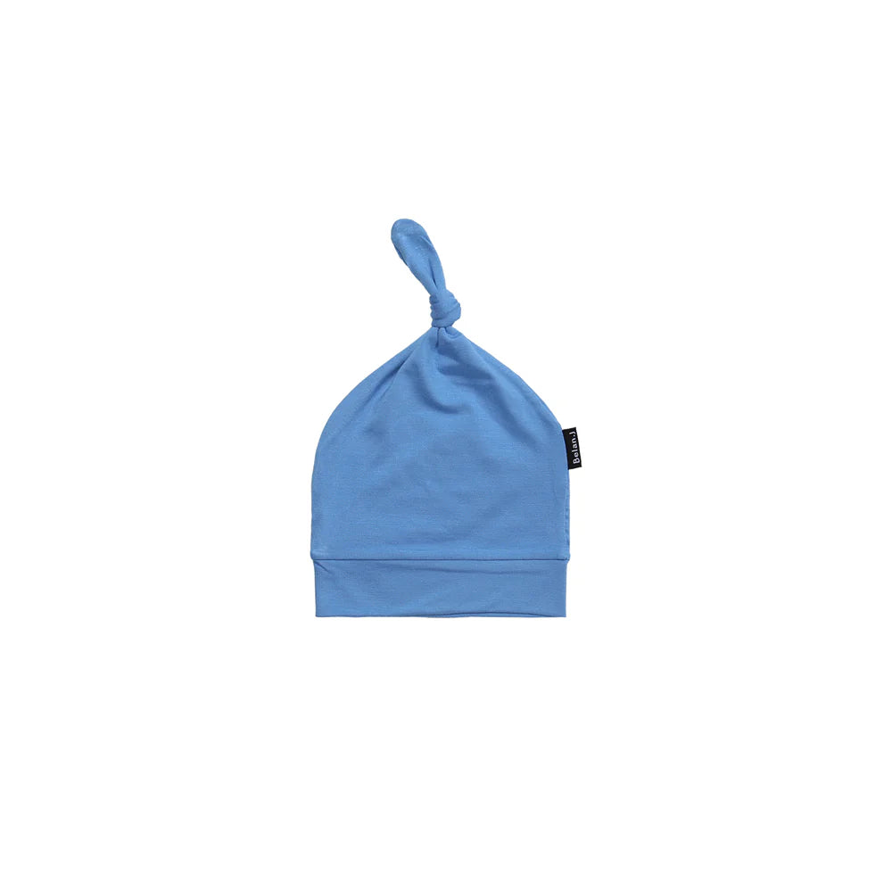 Blue baby hat on a white background