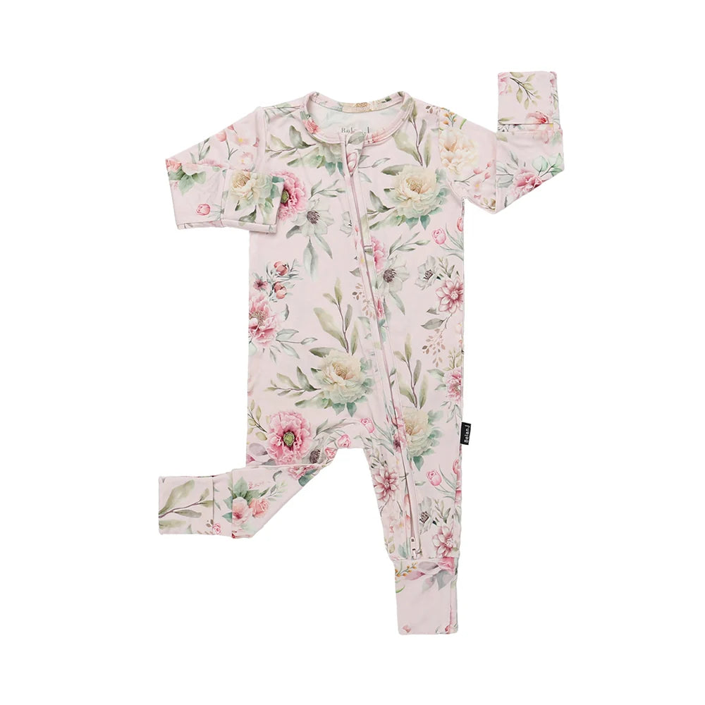 
                  
                    A baby long-sleeve footless one-piece romper in light pink with a watercolor floral print of pink, green, and white flowers, shown flat on a white background.
                  
                