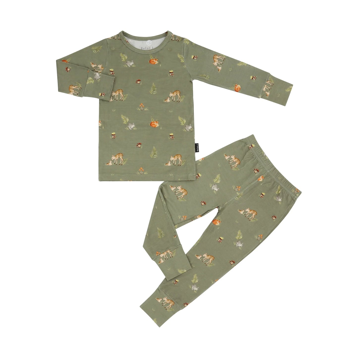 
                  
                    A two-piece children's pajama set in sage green, featuring a long-sleeve top and matching pants with an all-over woodland print of foxes, rabbits, and mushrooms, laid out on a solid white background.
                  
                