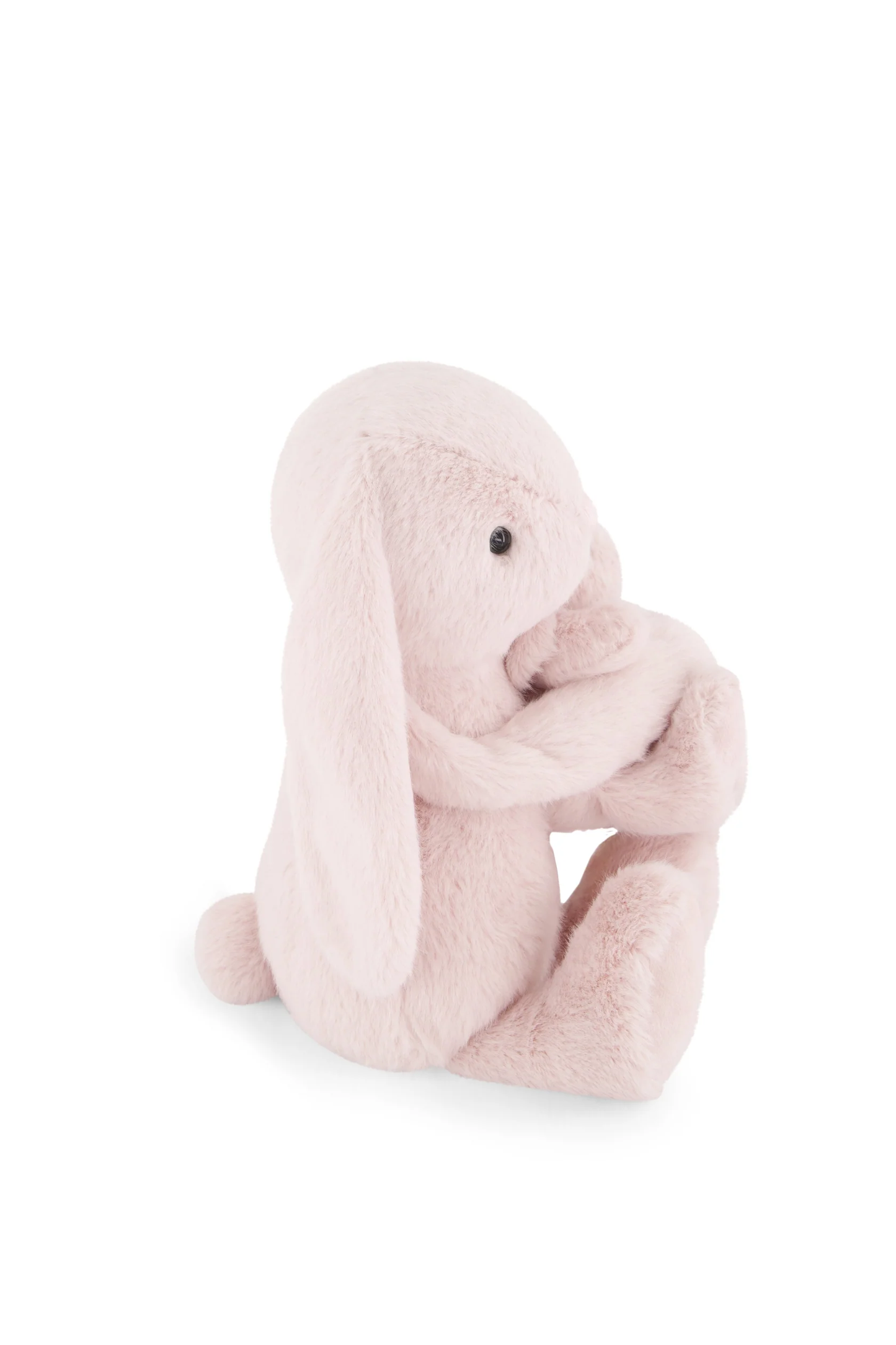 
                  
                    Pink plush toy bunny on a white background.
                  
                