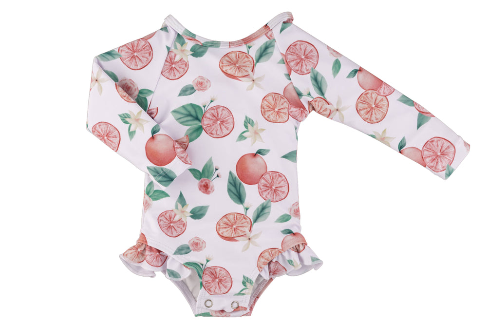 
                  
                    The "Bella" Ruffle Rashguard Suit
                  
                
