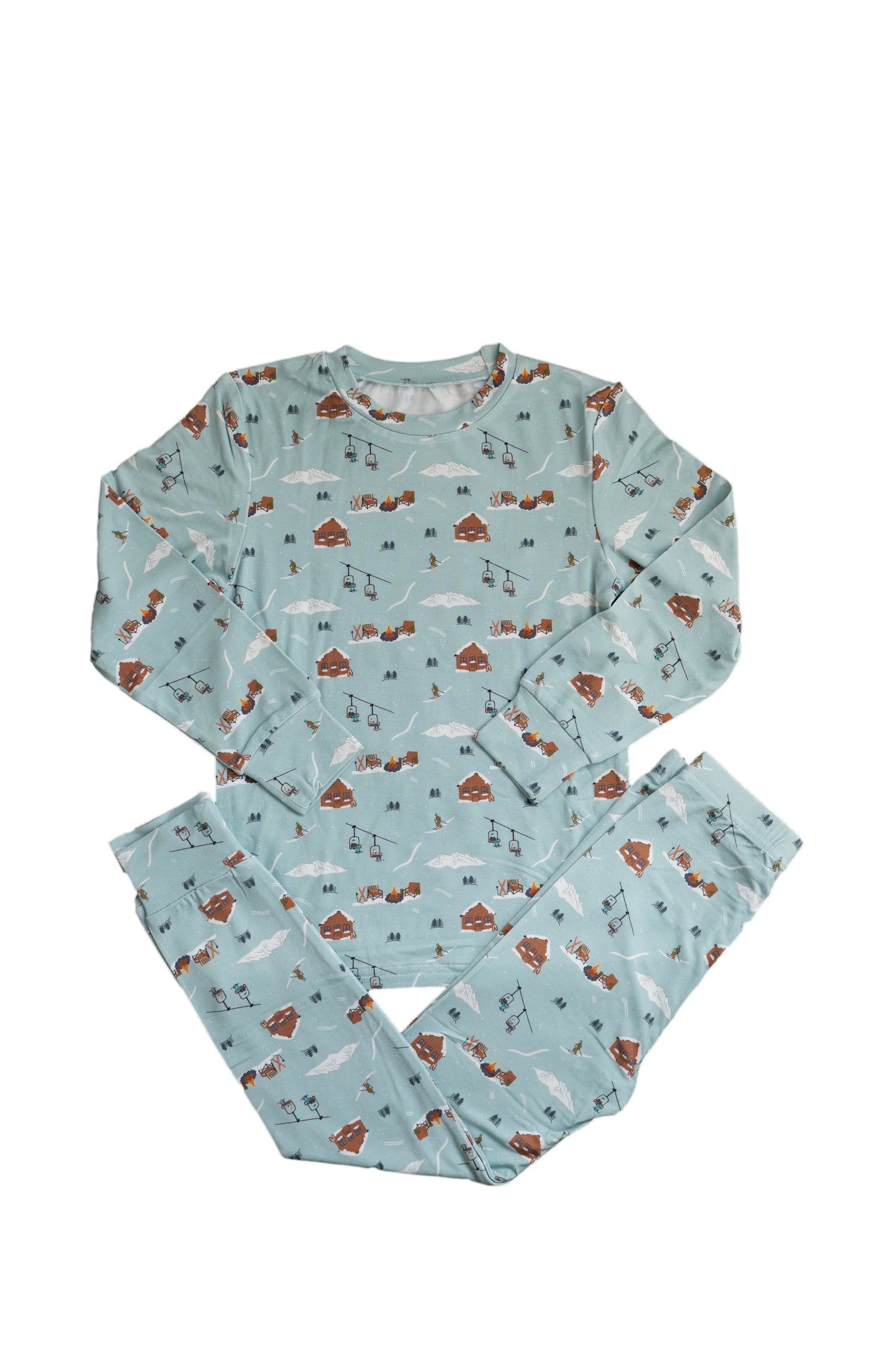 
                  
                    A light blue bamboo lounge set with a ski resort themed print against a white background. 
                  
                