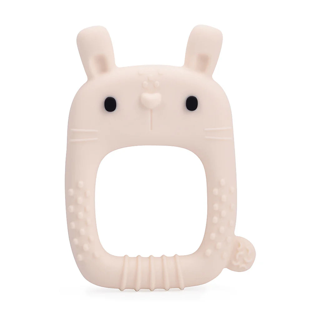 A silicone teether in the shape of a bunny with textured sides and a small cut-out for easy gripping.